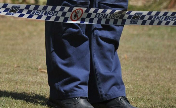 Crime scene investigator with Police tape. Crime scene investigator with Police tape.